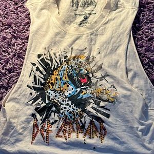 Why does cream top with small holes by Goody two sleeves